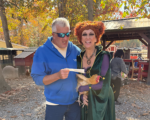 South Jersey Mopar Connection Member/Officer John Miller and Laurie Zaleski (in Halloween Costume), founder of Funny Farm Rescue